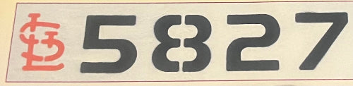 Vintage-style address marker with red symbol and black text '5827'